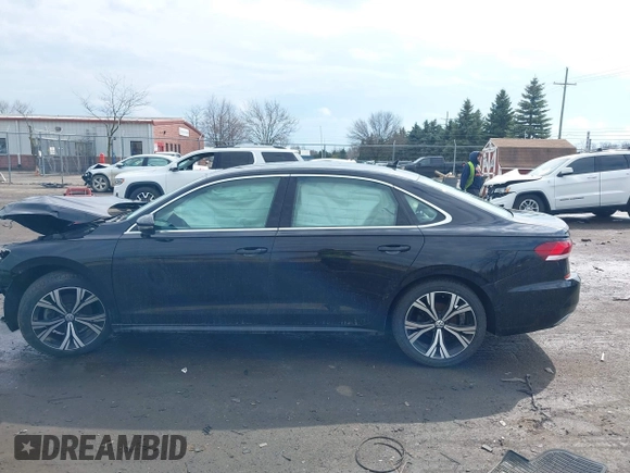 2021 Volkswagen Passat SE z VIN 1VWSA7A36MC014185, wystawiony jako IAAI lot #41915701 z przebiegiem 175 043 mil mil oraz . Historia ofert i sprzedaży dostępna na DreamBid. Obrazek 14.