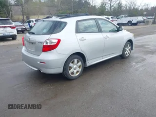 2009 Toyota Matrix with VIN 2T1KU40E99C006768, listed as a IAAI auction lot 42125813 with 163,832 mi miles. Bid and sale history available at carsss.com. Image 4.