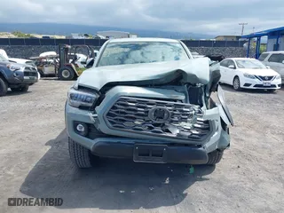 2023 Toyota Tacoma 4WD SR with VIN 3TYCZ5AN7PT145185, listed as a IAAI auction lot 41658297 with 23,647 mi miles. Bid and sale history available at carsss.com. Image 12.