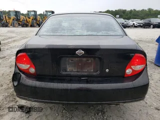 2000 Nissan Maxima GXE z VIN JN1CA31A8YT210913, wystawiony jako Copart lot #56272455 z przebiegiem 281 645 mil mil oraz Nie do naprawy • Non repairable. Historia ofert i sprzedaży dostępna na DreamBid. Obrazek 6.