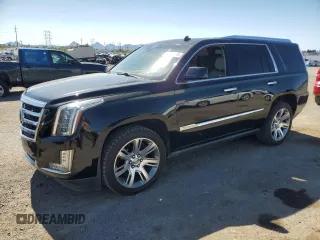 2015 Cadillac Escalade Premium with VIN 1GYS4CKJ6FR199820, listed as a Copart auction lot 59918815 with 116,210 mi miles and Salvage title. Bid and sale history available at DreamBid. Image 1.