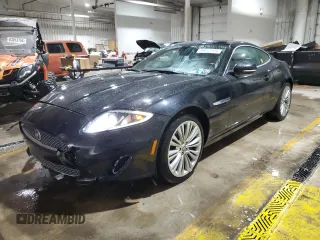 2012 Jaguar XK with VIN SAJWA4FB4CLB46397, listed as a Copart auction lot 88032325 with 65,321 mi miles and Salvage Title. Bid and sale history available at carsss.com. Image 1.