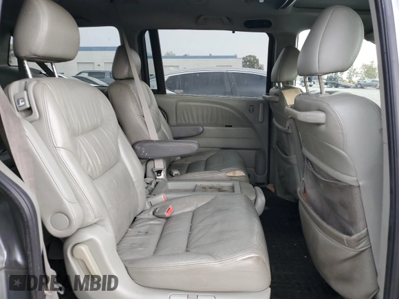 2007 Honda Odyssey EX-L z VIN 5FNRL38637B004323, wystawiony jako Copart lot #59626045 z przebiegiem 178 069 mil mil oraz Szkoda całkowita • Salvage title. Historia ofert i sprzedaży dostępna na DreamBid. Obrazek 11.