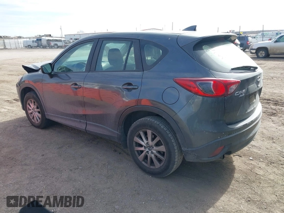 2016 Mazda CX-5 Sport with VIN JM3KE4BY0G0623365, listed as a IAAI auction lot 41525002 with 127,674 mi miles and . Bid and sale history available at carsss.com. Image 3.