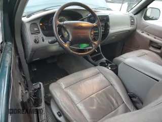 1997 Ford Explorer with VIN 1FMCU24E5VUB71602, listed as a Copart auction lot 87081674 with 193,534 mi miles and Salvage title. Bid and sale history available at DreamBid. Image 8.