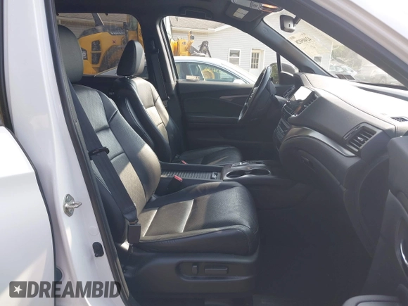 2019 Honda Passport EX-L with VIN 5FNYF8H56KB029748, listed as a IAAI auction lot 42405028 with 59,009 mi miles and . Bid and sale history available at DreamBid. Image 5.