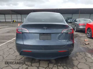 2022 Tesla Model Y Long Range with VIN 7SAYGDEE8NF317482, listed as a IAAI auction lot 41806043 with 32,108 mi miles and . Bid and sale history available at carsss.com. Image 17.