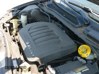 2016 Dodge Grand Caravan SE z VIN 2C4RDGBG9GR154852, wystawiony jako IAAI lot #42658200 z przebiegiem 140 417 mil mil oraz . Historia ofert i sprzedaży dostępna na DreamBid. Obrazek 12.