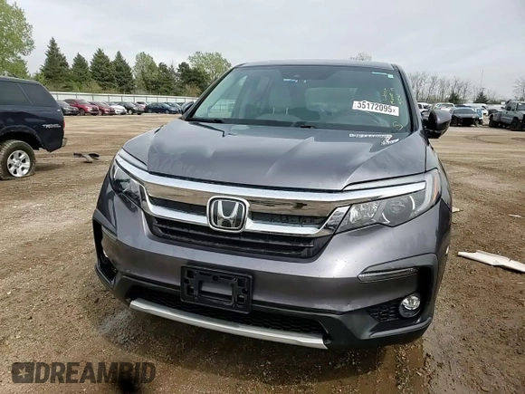 2020 Honda Pilot EX-L with VIN 5FNYF5H57LB006558, listed as a Copart auction lot 55172095 with 58,863 mi miles and Salvage title. Bid and sale history available at DreamBid. Image 14.