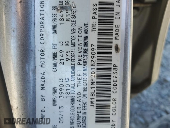 2013 Mazda 3 i Grand Touring with VIN JM1BL1MP2D1829097, listed as a Copart auction lot 64819055 with Not provided miles and Salvage title. Bid and sale history available at DreamBid. Image 12.