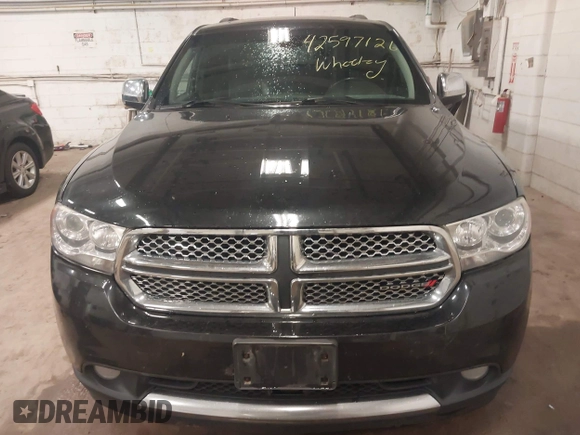 2013 Dodge Durango Citadel with VIN 1C4SDJET9DC661861, listed as a IAAI auction lot 42597126 with 187,631 mi miles and . Bid and sale history available at DreamBid. Image 12.
