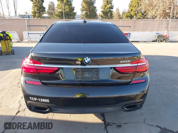 2018 BMW 7 Series 750i with VIN WBA7F0C50JGM24160, listed as a IAAI auction lot 41448519 with 138,742 mi miles. Bid and sale history available at carsss.com. Image 16.