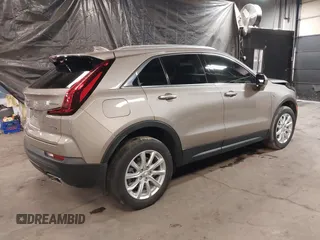 2023 Cadillac XT4 AWD Luxury with VIN 1GYFZBR48PF174059, listed as a IAAI auction lot 41505630 with 4,757 mi miles. Bid and sale history available at carsss.com. Image 4.