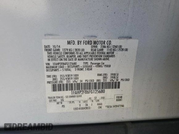2015 Ford Taurus Limited with VIN 1FAHP2F86FG125680, listed as a Copart auction lot 42934535 with 122,156 mi miles and Salvage Title. Bid and sale history available at DreamBid. Image 15.