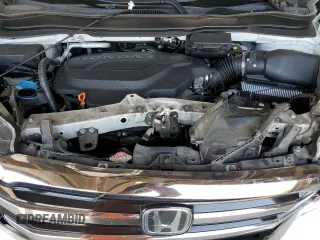 2018 Honda Pilot Touring с VIN 5FNYF6H98JB053524, выставлен на аукционе Copart как лот 61447785 с пробегом 114 942 миль миль и Списание • Salvage title. История ставок и продаж доступна на DreamBid. Изображение 11.