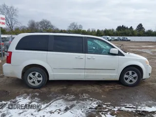 2010 Dodge Grand Caravan SXT with VIN 2D4RN5D18AR218903, listed as a IAAI auction lot 41560484 with Not Provided miles and . Bid and sale history available at DreamBid. Image 13.