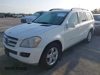 2007 Mercedes-Benz GL-Class with VIN 4JGBF71E77A210198, listed as a IAAI auction lot 42020424 with 104,729 mi miles. Bid and sale history available at carsss.com. Image 2.