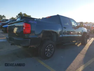 2018 Chevrolet Silverado 1500 Work Truck with VIN 3GCUKNEC8JG402700, listed as a IAAI auction lot 41015830 with 107,781 mi miles. Bid and sale history available at carsss.com. Image 4.