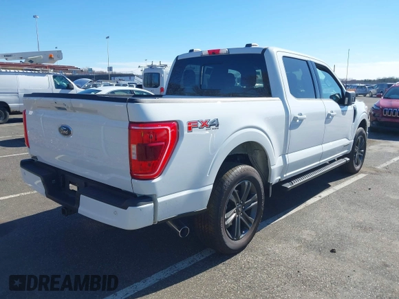 2023 Ford F-150 XL with VIN 1FTFW1ED0PFA18306, listed as a IAAI auction lot 41690965 with 49,988 mi miles. Bid and sale history available at carsss.com. Image 4.
