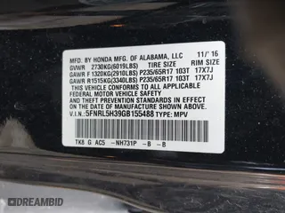2016 Honda Odyssey SE with VIN 5FNRL5H39GB155488, listed as a IAAI auction lot 41702336 with 122,164 mi miles. Bid and sale history available at carsss.com. Image 9.