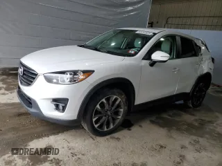 2016 Mazda CX-5 Grand Touring z VIN JM3KE4DY4G0875889, wystawiony jako Copart lot #53252825 z przebiegiem 207 902 mil mil oraz Szkoda całkowita • Salvage title. Historia ofert i sprzedaży dostępna na DreamBid. Obrazek 1.