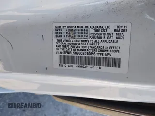 2012 Honda Odyssey Touring with VIN 5FNRL5H96CB010696, listed as a IAAI auction lot 41605868 with 109,411 mi miles and . Bid and sale history available at carsss.com. Image 9.