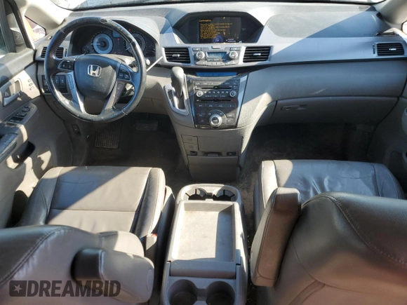2013 Honda Odyssey Touring with VIN 5FNRL5H90DB003003, listed as a Copart auction lot 58519345 with 259,383 mi miles and Salvage title. Bid and sale history available at DreamBid. Image 8.