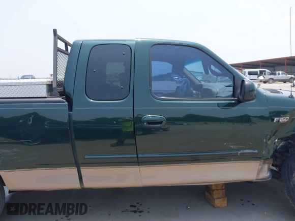 2001 Ford F-150 XL z VIN 1FTZX17201NA28384, wystawiony jako IAAI lot #39496964 z przebiegiem 65 695 mil mil oraz . Historia ofert i sprzedaży dostępna na DreamBid. Obrazek 13.