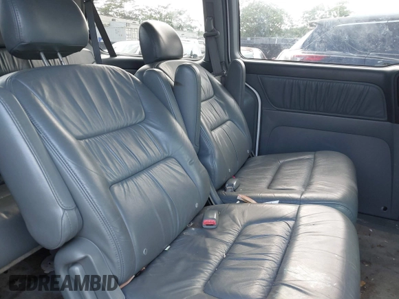 2004 Honda Odyssey EX-L with VIN 5FNRL18924B064040, listed as a IAAI auction lot 41350306 with 130,803 mi miles and . Bid and sale history available at DreamBid. Image 8.