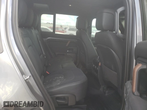 2023 Land Rover Defender X with VIN SALEXEEU6P2136280, listed as a Copart auction lot 77014604 with 27,736 mi miles and Salvage title. Bid and sale history available at DreamBid. Image 11.