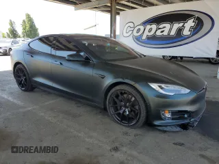 2018 Tesla Model S 75D with VIN 5YJSA1E21JF282786, listed as a Copart auction lot 58058595 with 65,982 mi miles and Salvage title. Bid and sale history available at DreamBid. Image 4.