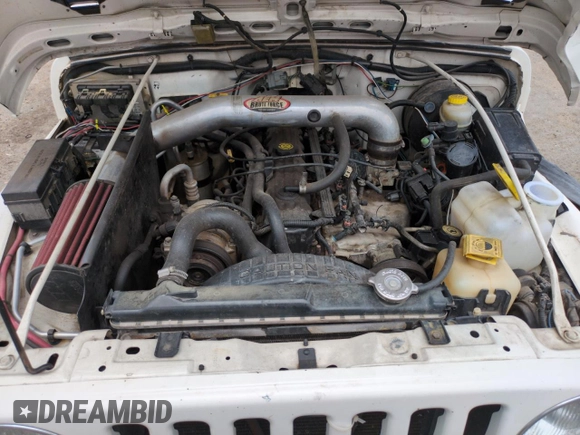 1999 Jeep Wrangler Sport with VIN 1J4FY19S2XP421162, listed as a Copart auction lot 57683835 with 152,636 mi miles and Salvage title. Bid and sale history available at DreamBid. Image 11.