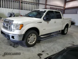 2012 Ford F-150 XL with VIN 1FTFW1ET7CFA22774, listed as a Copart auction lot 61738675 with 211,027 mi miles and Salvage title. Bid and sale history available at DreamBid. Image 1.