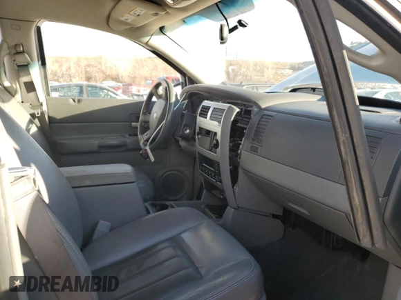 2005 Dodge Durango Limited with VIN 1D4HD58N95F533279, listed as a Copart auction lot 46454565 with 130,639 mi miles and Salvage title. Bid and sale history available at DreamBid. Image 7.