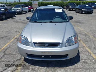 1997 Honda Civic LX z VIN 2HGEJ6670VH570062, wystawiony jako IAAI lot #42218254 z przebiegiem 86 555 mil mil oraz . Historia ofert i sprzedaży dostępna na DreamBid. Obrazek 12.