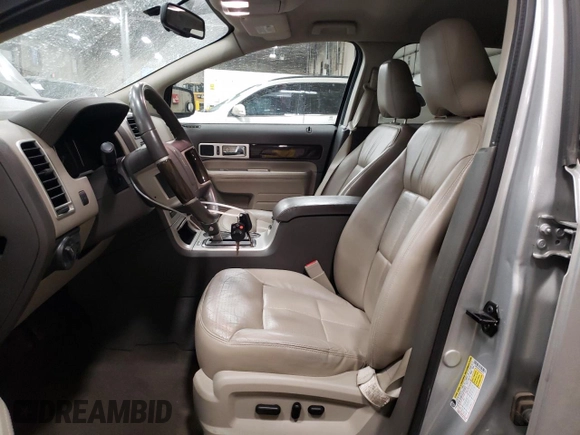 2009 Lincoln MKX with VIN 2LMDU68C69BJ09162, listed as a Copart auction lot 89259625 with 124,908 mi miles and Salvage Title. Bid and sale history available at DreamBid. Image 7.