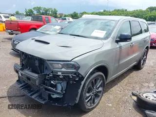 2022 Dodge Durango GT Plus with VIN 1C4RDJDG1NC213263, listed as a IAAI auction lot 42639103 with 77,061 mi miles and . Bid and sale history available at DreamBid. Image 17.