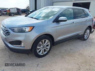 2022 Ford Edge Titanium with VIN 2FMPK4K99NBB06136, listed as a IAAI auction lot 42733977 with 57,794 mi miles and . Bid and sale history available at DreamBid. Image 17.