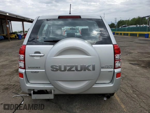 2008 Suzuki Grand Vitara w/Spare & Cargo Covers with VIN JS3TD941784100899, listed as a Copart auction lot 62581725 with 104,502 mi miles and Salvage title. Bid and sale history available at DreamBid. Image 6.
