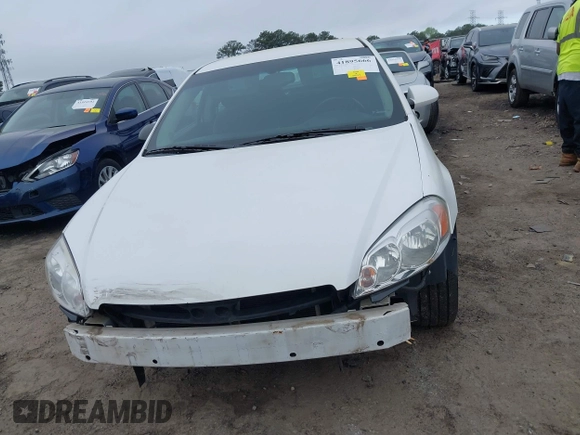 2014 Chevrolet Impala LS with VIN 2G1WA5E31E1163087, listed as a IAAI auction lot 41895666 with 138,348 mi miles and . Bid and sale history available at DreamBid. Image 13.