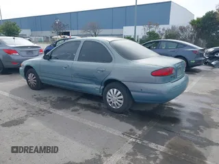 1997 Ford Contour LX with VIN 1FALP6533VK156310, listed as a IAAI auction lot 41567292 with 79,619 mi miles and . Bid and sale history available at DreamBid. Image 3.