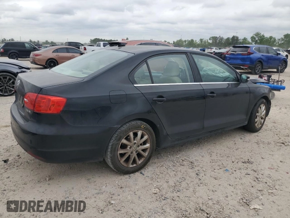 2013 Volkswagen Jetta SE with VIN 3VWDX7AJXDM400161, listed as a Copart auction lot 53249335 with 104,882 mi miles and Salvage title. Bid and sale history available at DreamBid. Image 3.