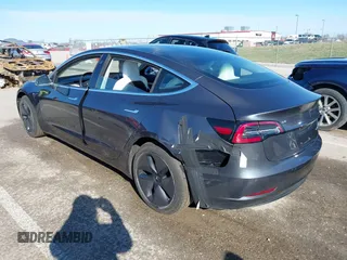 2018 Tesla Model 3 Long Range Battery with VIN 5YJ3E1EB6JF122167, listed as a IAAI auction lot 41761710 with 76,199 mi miles and . Bid and sale history available at DreamBid. Image 3.