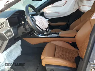 2021 Audi RS 7 z VIN WUAPCBF26MN906501, wystawiony jako Copart lot #37039103 z przebiegiem Nie podano mil oraz . Historia ofert i sprzedaży dostępna na DreamBid. Obrazek 7.