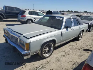 1987 Ford Crown Victoria z VIN 2FABP74F5HX169963, wystawiony jako Copart lot #75491944 z przebiegiem 89 729 mil mil oraz Szkody całkowita. Historia ofert i sprzedaży dostępna na DreamBid. Obrazek 1.