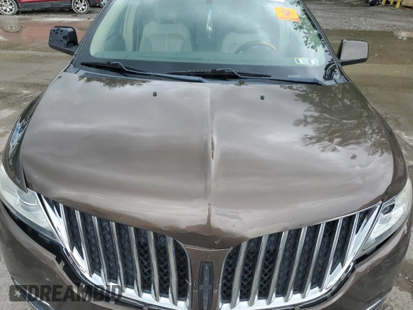 2011 Lincoln MKX z VIN 2LMDJ6JK5BBJ06463, wystawiony jako Copart lot #60041285 z przebiegiem 195 915 mil mil oraz Szkoda całkowita • Salvage title. Historia ofert i sprzedaży dostępna na DreamBid. Obrazek 12.