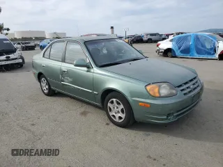 2004 Hyundai Accent GL with VIN KMHCG45C14U540938, listed as a Copart auction lot 46701935 with 71,891 mi miles and Salvage Title. Bid and sale history available at carsss.com. Image 4.