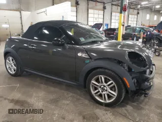 2013 MINI Roadster S z VIN WMWSY3C57DT593979, wystawiony jako Copart lot #68924454 z przebiegiem 61 578 mil mil oraz Szkody całkowita. Historia ofert i sprzedaży dostępna na DreamBid. Obrazek 4.