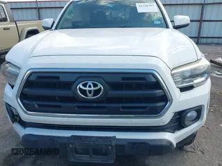 2017 Toyota Tacoma SR5 with VIN 5TFAZ5CN8HX043633, listed as a IAAI auction lot 41520703 with 104,711 mi miles and . Bid and sale history available at DreamBid. Image 12.
