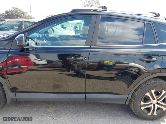 2018 Toyota RAV4 LE with VIN 2T3ZFREVXJW457751, listed as a IAAI auction lot 41529251 with 230,054 mi miles. Bid and sale history available at carsss.com. Image 15.